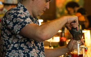 Jane Doe Lagavulin Event Behind the Bar